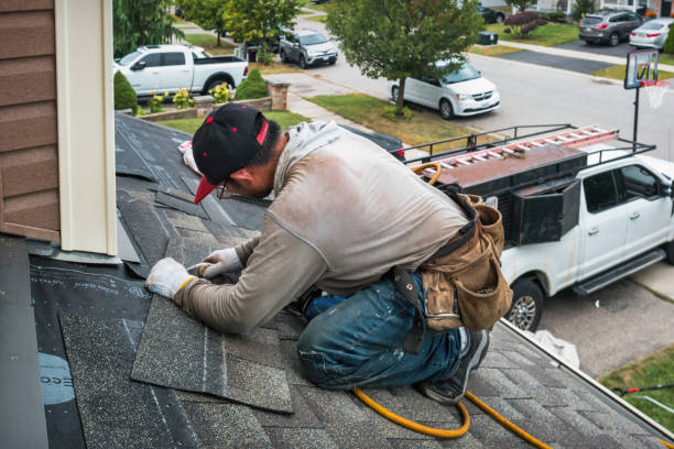 Professional Flat Roof Repair technician working in Hilltop, WV